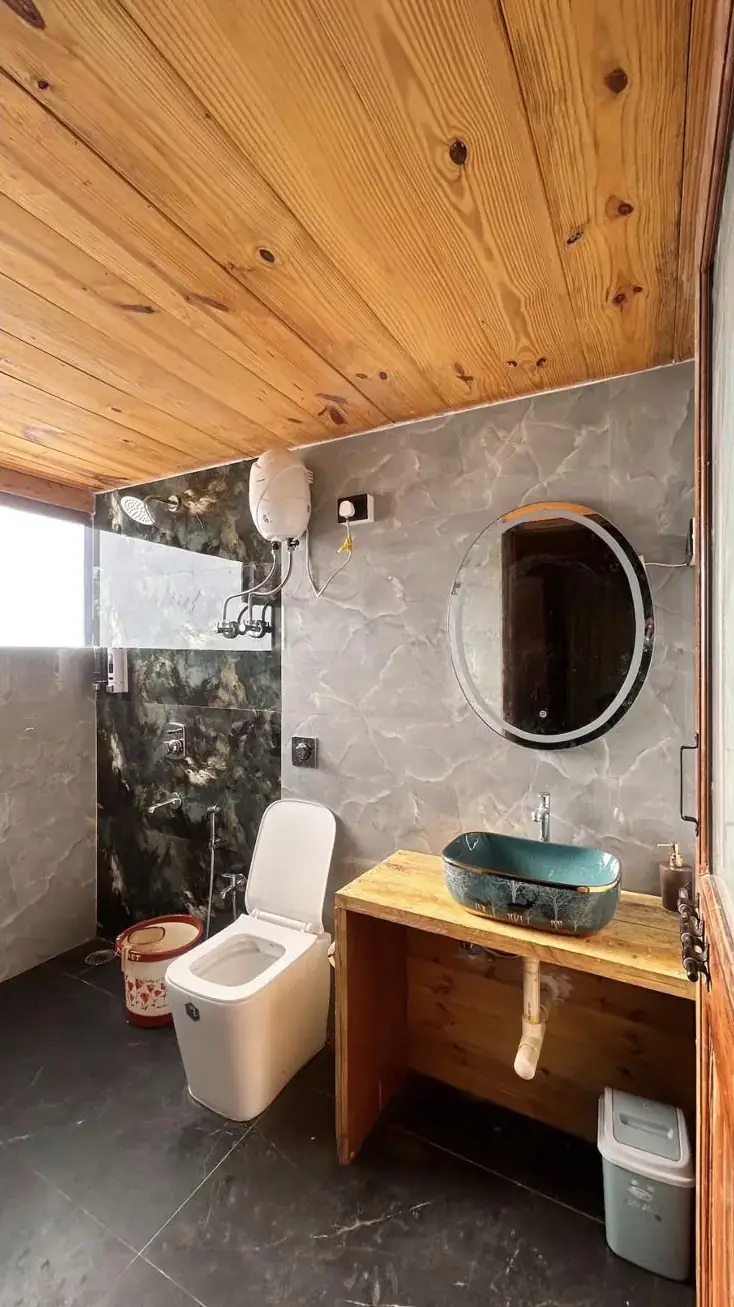 Cottage bathroom with rain shower and painted basin